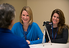 Portland researchers Dr. Erika Cottrell (left) and Lauren Saxton conduct an interview in connection with a TBI narratives project.