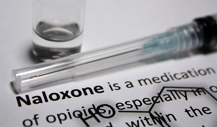 Opioid overdose education and naloxone distribution