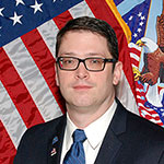 Dr. Justin Benzer 