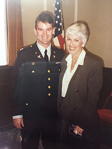 Dr. Matthew Bair is seen with his mother, Chris Bair, during his Army days. 