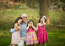  Dr. Paul King  with his children. 