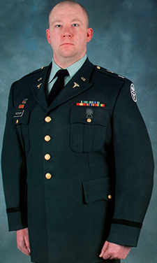 Dr. Riechers upon his promotion from captain to major in the U.S. Army. 