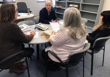 Dr. Michael Cucciare (center) meets with CREATE team members (from left) Kathy Marchant-Miros, BSN, Mitzi Mosier, and Traci Abraham, PhD. <em>(Photo by: Ashley McDaniel, South Central MIRECC)</em>  